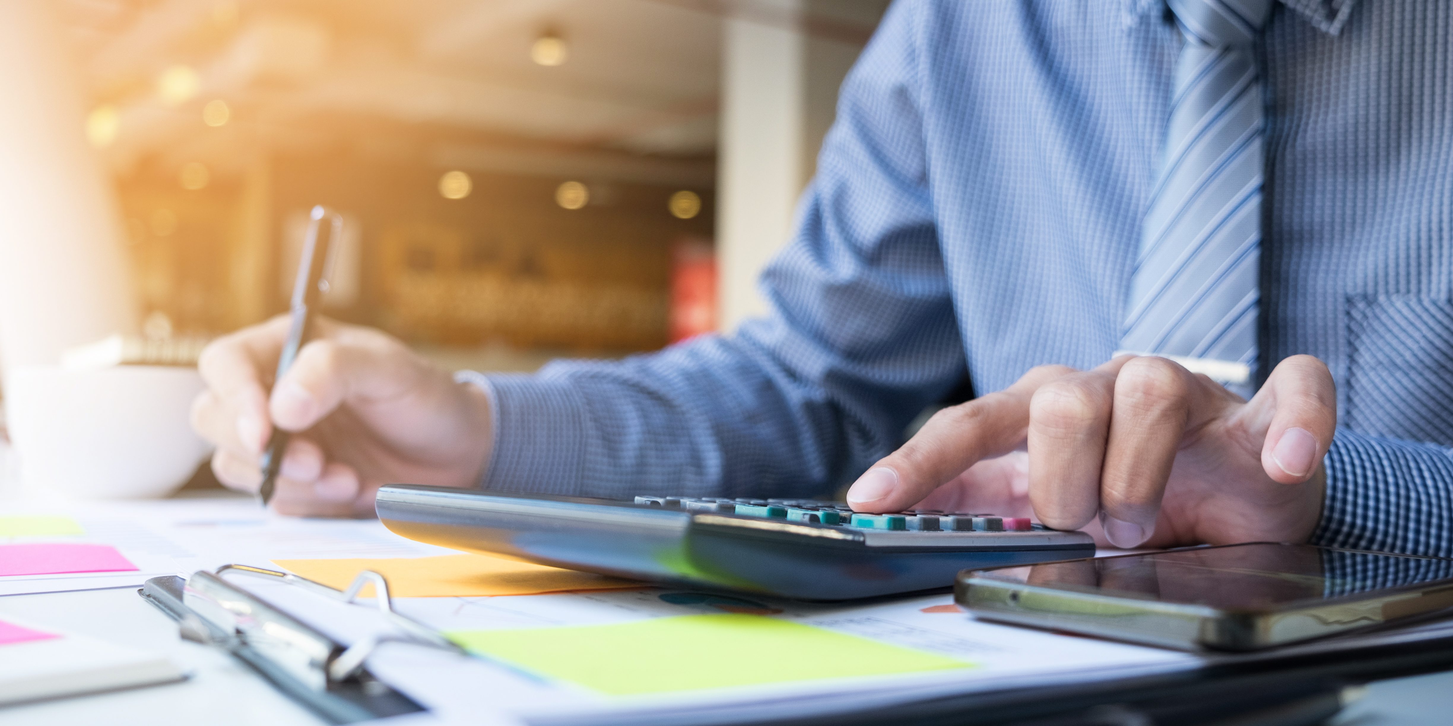 Business finance man calculating budget numbers, Invoices and fi